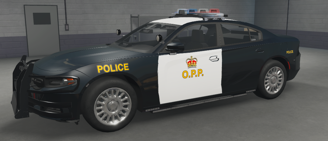 OPP Charger sedan with black and white livery and gold text